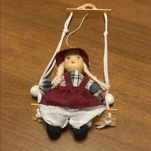 Vintage Handcrafted Doll with porcelain hand painted head on Wooden Swing